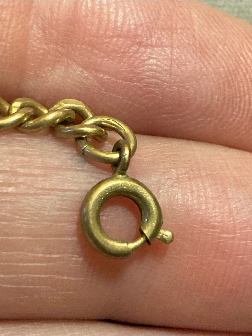 Gold Chain Bracelet marked 1/20 12K with Two 1/10 10K Medallion Charms